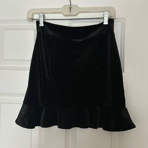 Black velvet mini skirt